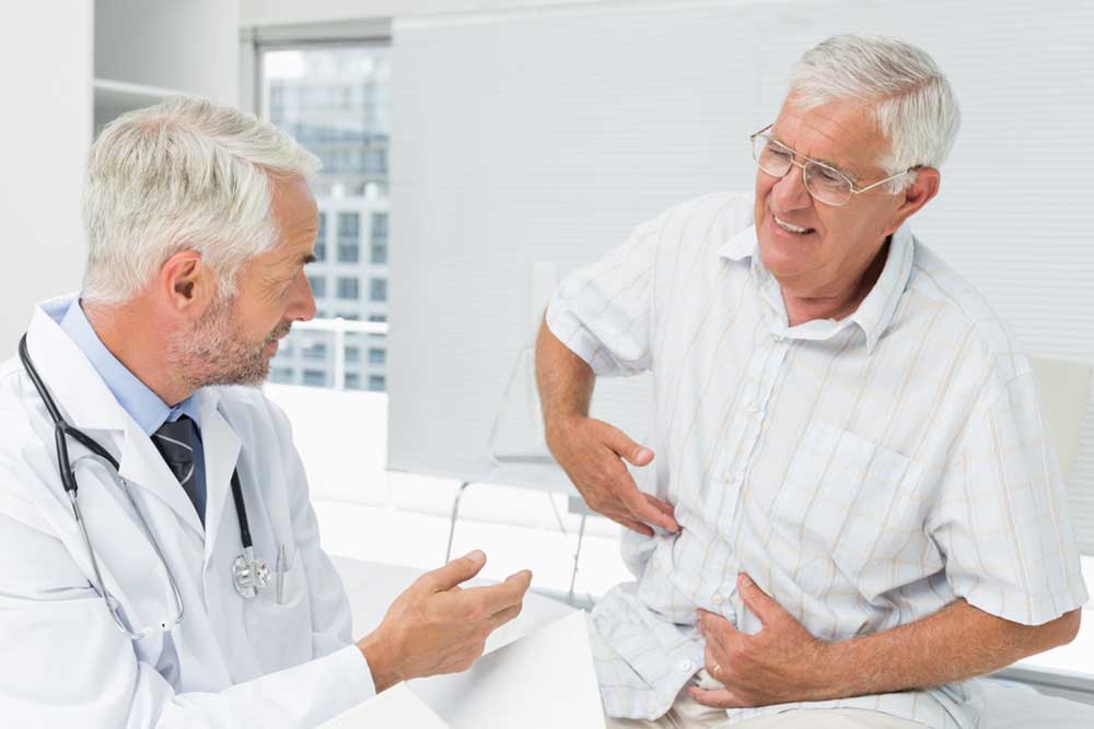 Male senior patient visiting a doctor at the medical office